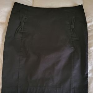 H&M black skirt. Bow Pockets. Size 10